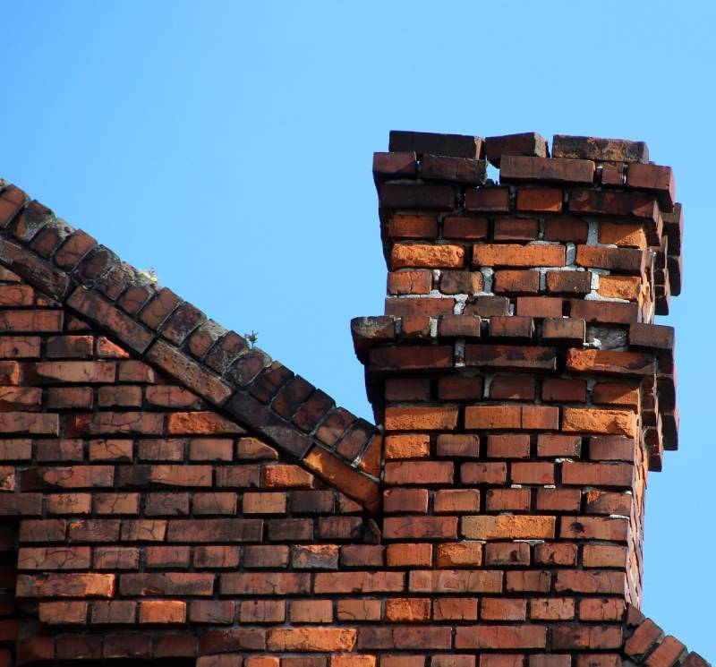 Signs Your Solana Beach Home Needs a Chimney Inspection Damaged chimney on an Solana Beach home showing cracks and missing mortar